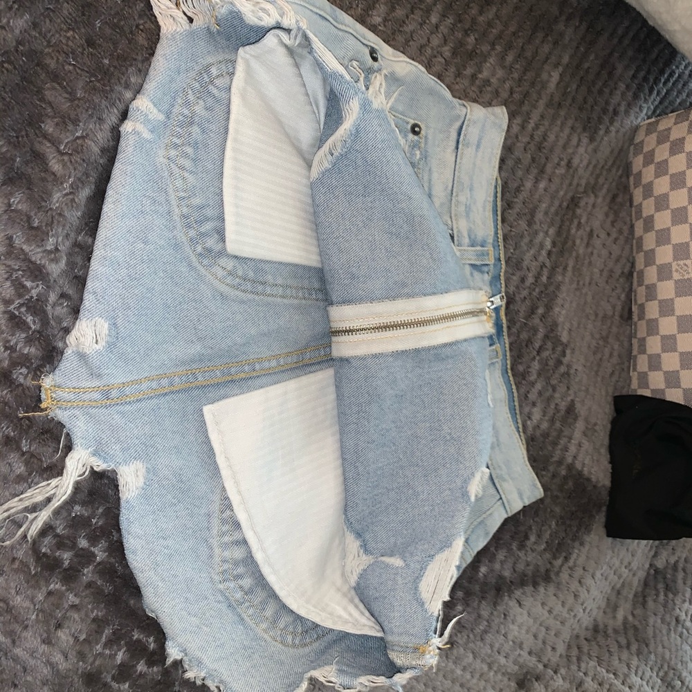 • Beatrice Zip Front Denim Mini Skirt